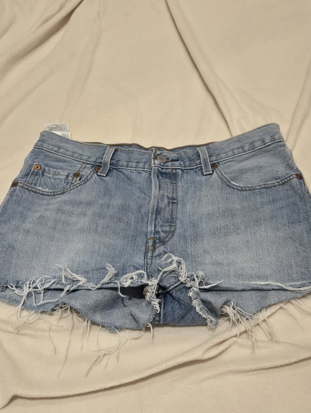 LEVI 501s Light Blue Distressed Hem Denim Shorts Size 28